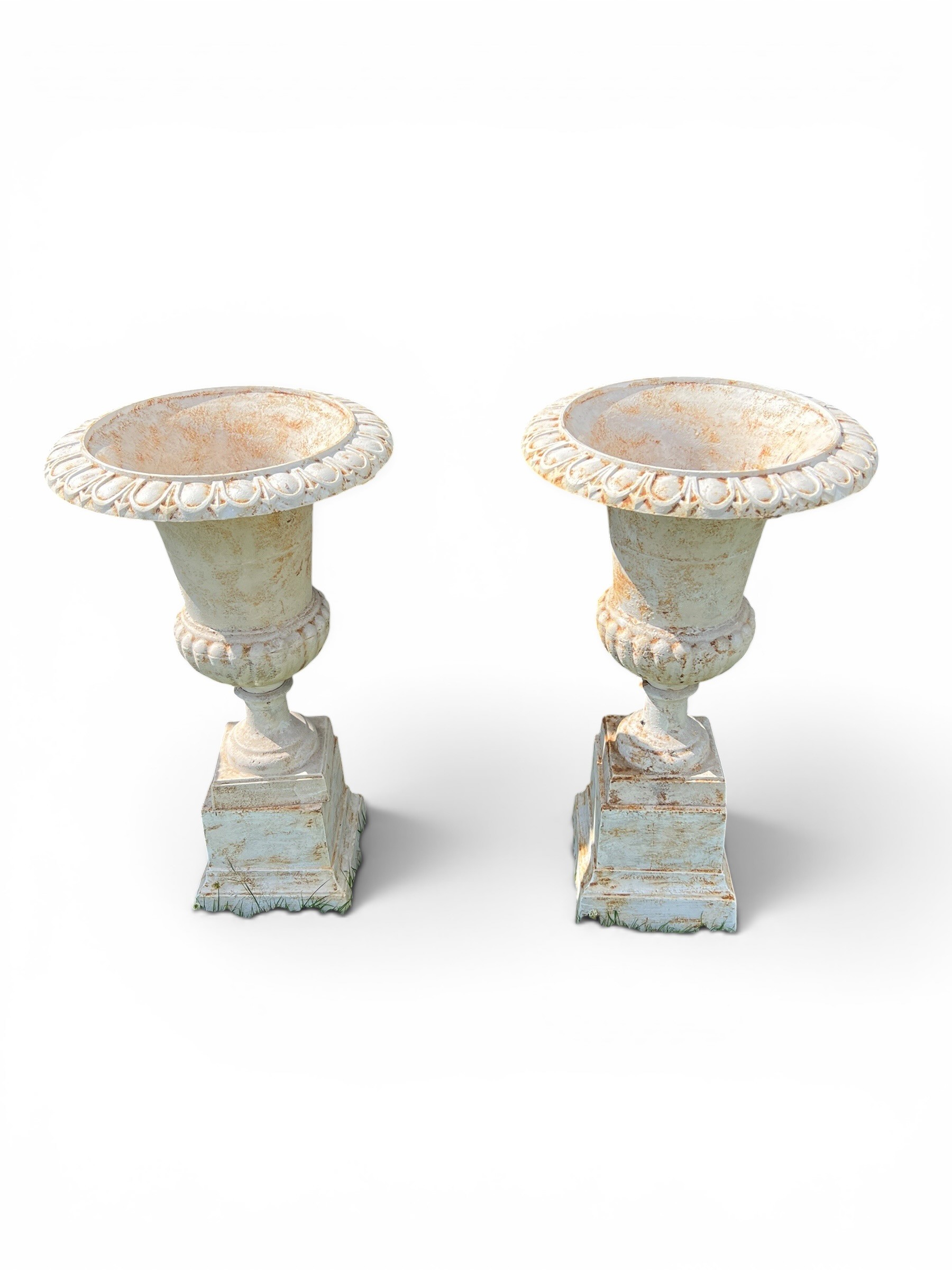 Pair of Large White Cast Iron Ornate Garden Urns Displayed on Two Cast Iron