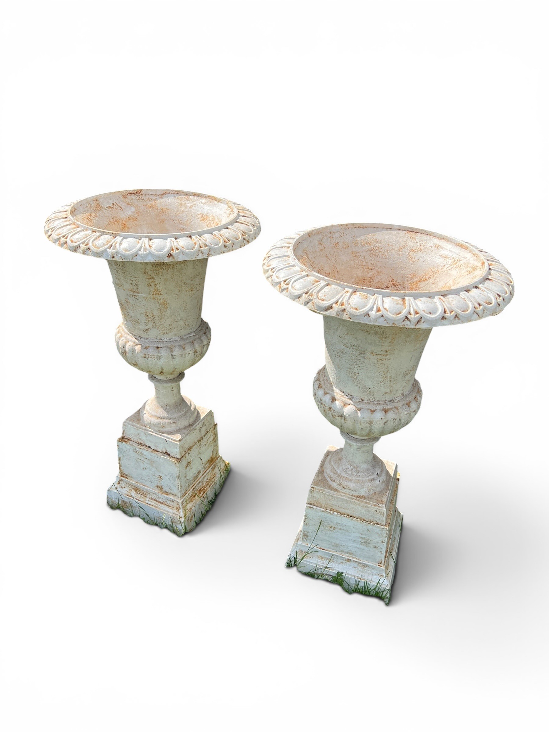 Pair of Large White Cast Iron Ornate Garden Urns Displayed on Two Cast Iron