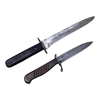 Two Trench Knives of World War I, German & Austrian. Forged steel, wooden grip plates. A pair of 