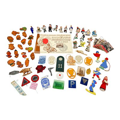 Large Lot of WHW Badges & Documents, Third Reich. Various materials such as plastic, wood 