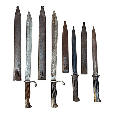 Four German Bayonets, Two Side Arms 98/05 and Two Side Arms 84/98 with Scabbards. Steel, wood 