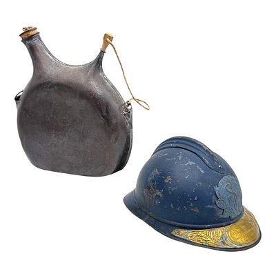 French Adrian Helmet with Medical Service Badge and Brass Memorial Plaque 1914–1918 with Canteen. 
