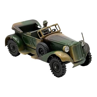 Military Jeep in Camouflage as Tin Model with Driver Figure and Clockwork Drive. Tin model of a 