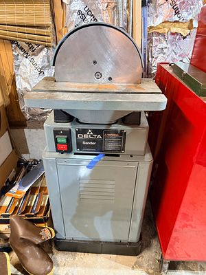Delta International Machinery Corp. Industrial 12-Inch Disc Sander with Cabinet Base. This is a 