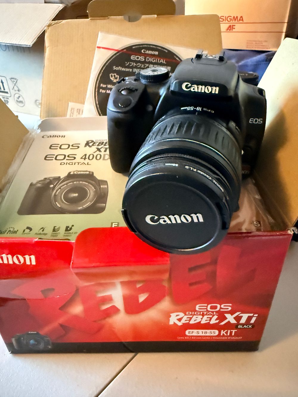 Canon EOS Digital Rebel XTi DSLR Camera Kit with EF-S 18-55mm Lens and Accessories. This lot 