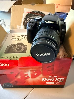 Canon EOS Digital Rebel XTi DSLR Camera Kit with EF-S 18-55mm Lens and Accessories. This lot 