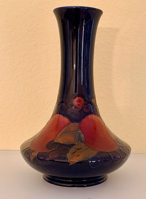 William Moorcroft Pomegranate Pattern Pottery Bottle Vase. A William Moorcroft glazed 