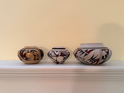 A Trio of Hopi-Tewa Polychrome Ceramic Seed Jars by Joy Navasie and Fawn Navasie. This 