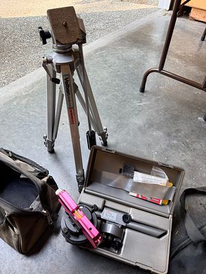 An Assortment of Surveying and Photographic Support Equipment including Velbon, CST/berger, and 