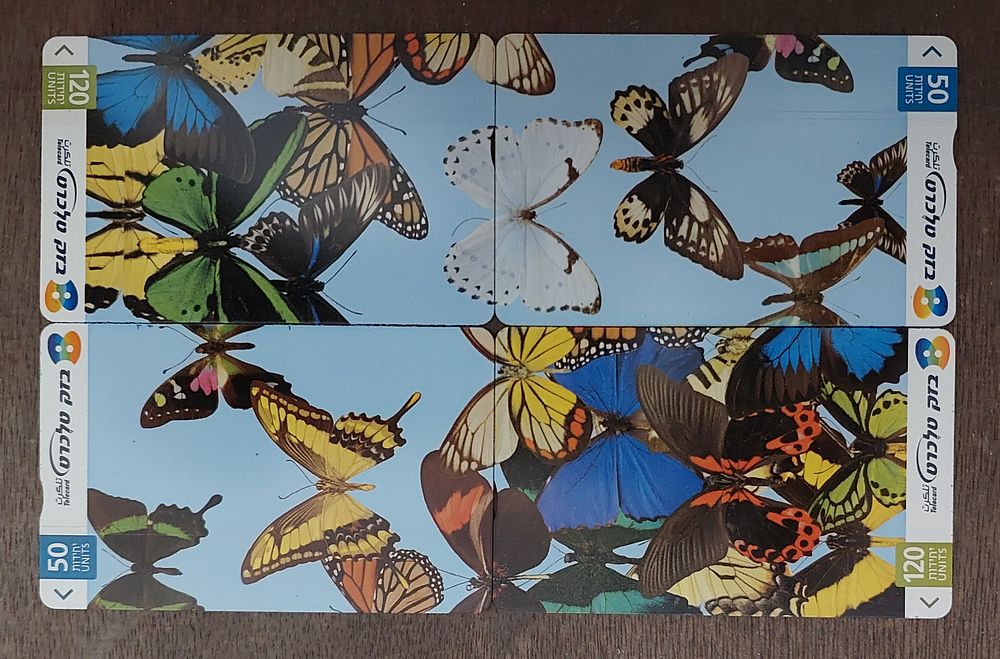 4 טלכרטים בזק, פזל פרפרים יפיפה, מצב מינט לא היו בשימוש ניבדק.