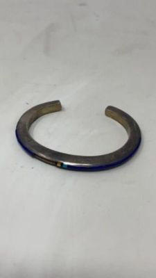 Navajo Jimmie Kng Jr Sterling Cuff, Earring, Watch. Cuff. Jimmie King cuff is missing a stone. 
