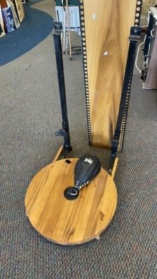 Everlast Hanging Punching Bag. wood piece with bag is strictly for wall decor between bars