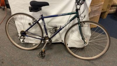 TREK 720 Multitrack Bike. Both tires are flat