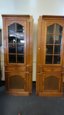 Side by Side Display Media Cabinets. Each one is 80 inches tall 29 inches wide