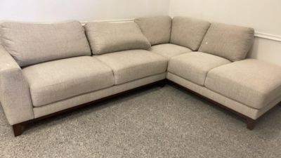 Very Clean Living Spaces 2 pc Sectional Sofa. appears to be new condition