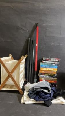 Folding Magazine Rack, James Patterson Paperback. 12 James Patterson books, floor sweeper
