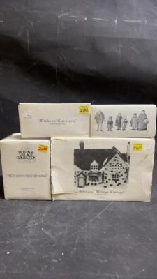 4 Heritage Village Collection in Original Box. Heritage village collection carolers on the 