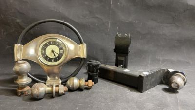 Tow hitch,Taser, Vintage steering wheel clock. Clock, taser, tow hitches