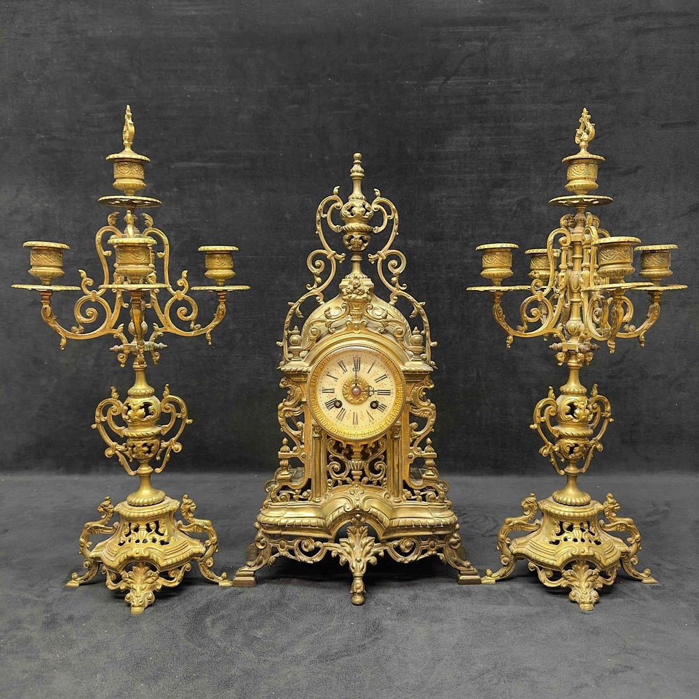 Lot 7: Tiffany and Company Brass Roman Numerals French Baroque Style Mantle Clock Five Light Candelabra Set