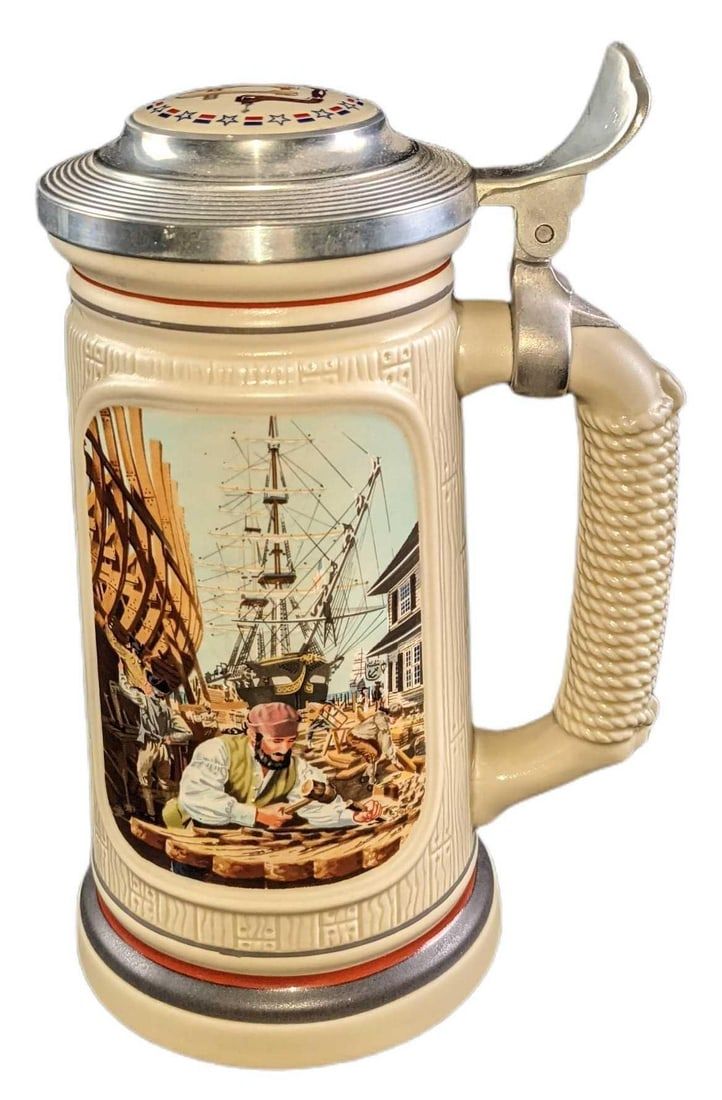 Lot 48: 1985 Avon, "The Building of America, The Shipbuilder" LE Beer Stein