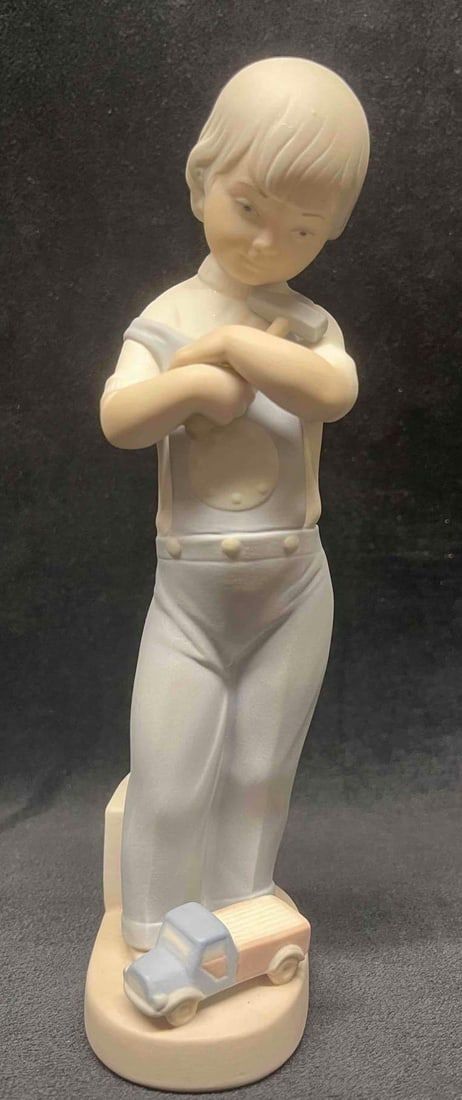 Lot 49: Lladro Mechanic Boy 4897
