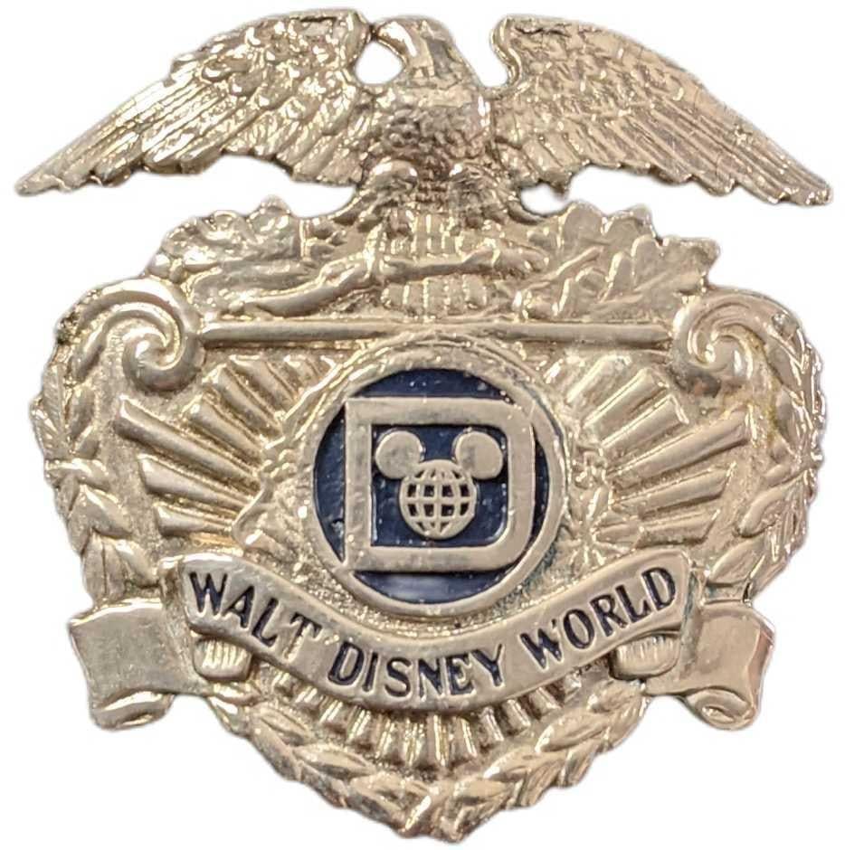 Lot 100: 1970s/1980s Walt Disney World Security Hat Badge