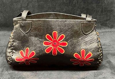 Vintage Leather Handicraft Purse With Embossed Flowers (20). This lot contains a Vintage Leather 