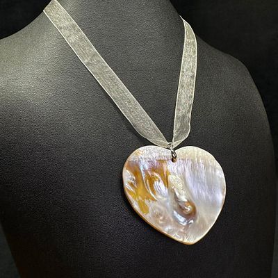 Hand-Carved Blister Pearl Necklace - Heart. This piece of jewelry has been tested and researched 