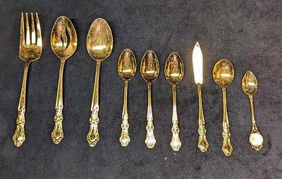 Assorted Cambridge Gold Electroplated Stainless Flatware. This lot includes: 
(3) Teaspoons. 