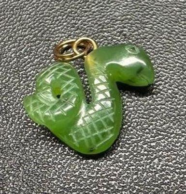Jade Snake Pendant. This piece of jewelry has been tested and researched prior to listing. 