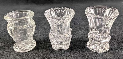 Three Clear Glass Pod Vases Or Toothpick Holders. Both range about 2" x 2" x 2 1/2" and the 