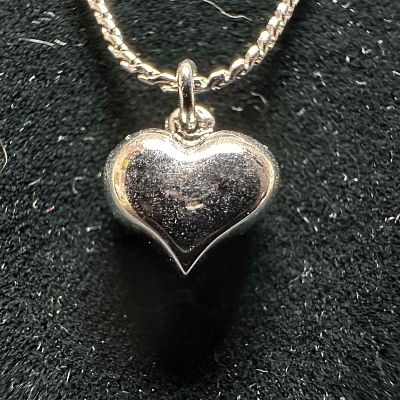Sterling Silver Avon Necklace Puffy Heart Charm 18" Chain. This item is in good pre-owned 