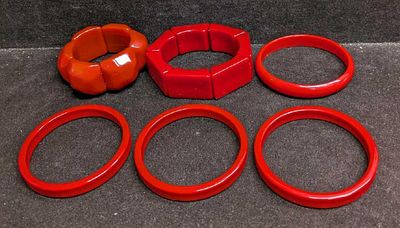 6 Vintage Plastic Lucite Red Bracelets. None of these bracelets have company or creator 