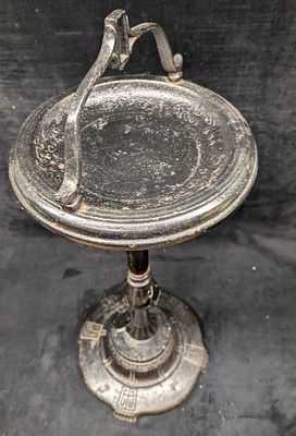 Vintage Black Metal Traditional Ashtray. The bottom is made of a heavy cast iron metal, while 