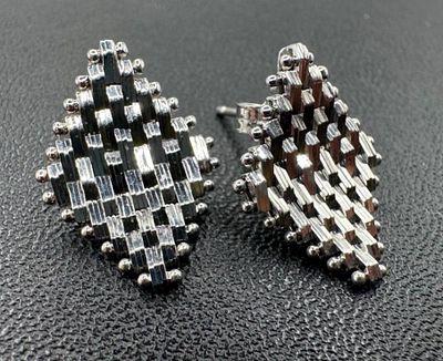 14k White Gold Weave Link Diamond Shaped Earrings. This piece of jewelry has been tested and 