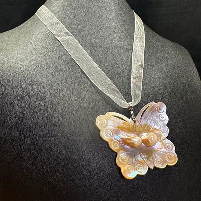 Hand-Carved Blister Pearl Necklace - Butterfly. This piece of jewelry has been tested and 