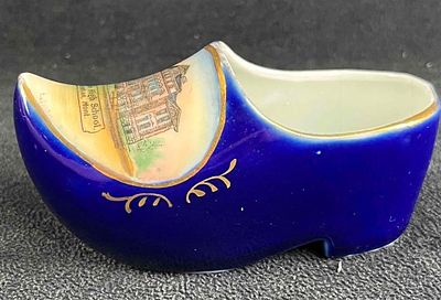 Vintage Porcelain German Clog This porcelain clog is blue with gold accents and has a painted 