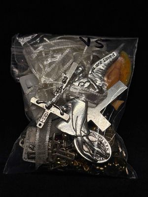 4.6 OZ An Angels Trinket Bag Religious Charms Beads Buttons and More. This lot contains loose 