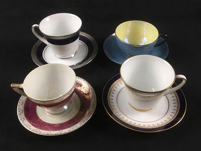 Lot of 4 Teacups and Saucers. This set is in good condition. Only one of the saucers has a chip 