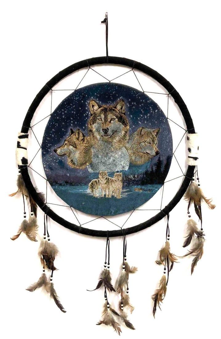 Dream Catcher With Wolves & Moon Design. This lot contains a dream catcher with wolves and a 