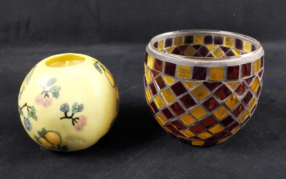 Hand Sculpted Candle And Mosaic Canister. This lot includes: 
(1) Small Mosaic Glass Canister. 