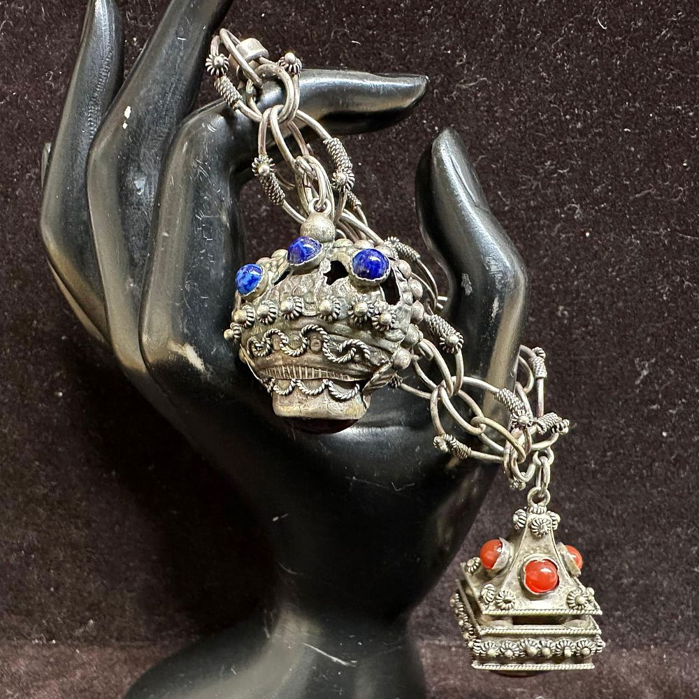 Etruscan Revival Style Multi Colored Gemstone Charm Bracelet L90. This item is in good pre-owned 