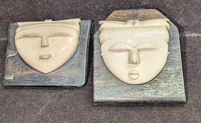 2 Vintage Carved Masks Mounted on Ebony in Japanese Style; these carved masks are in an 