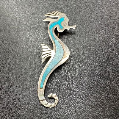 Sterling Seahorse Brooch Turquoise Inlay. This piece of jewelry has been tested and researched 