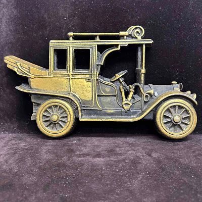 Vintage Metal Cast Iron Car Automobile Sign Banthrico Taico. This item is in pre owned 