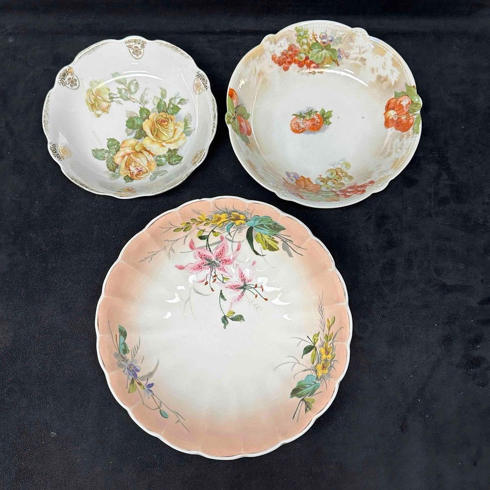 Floral and Fruit China Germany Bowl Set. Minor staining and marks throughout each plate due to 