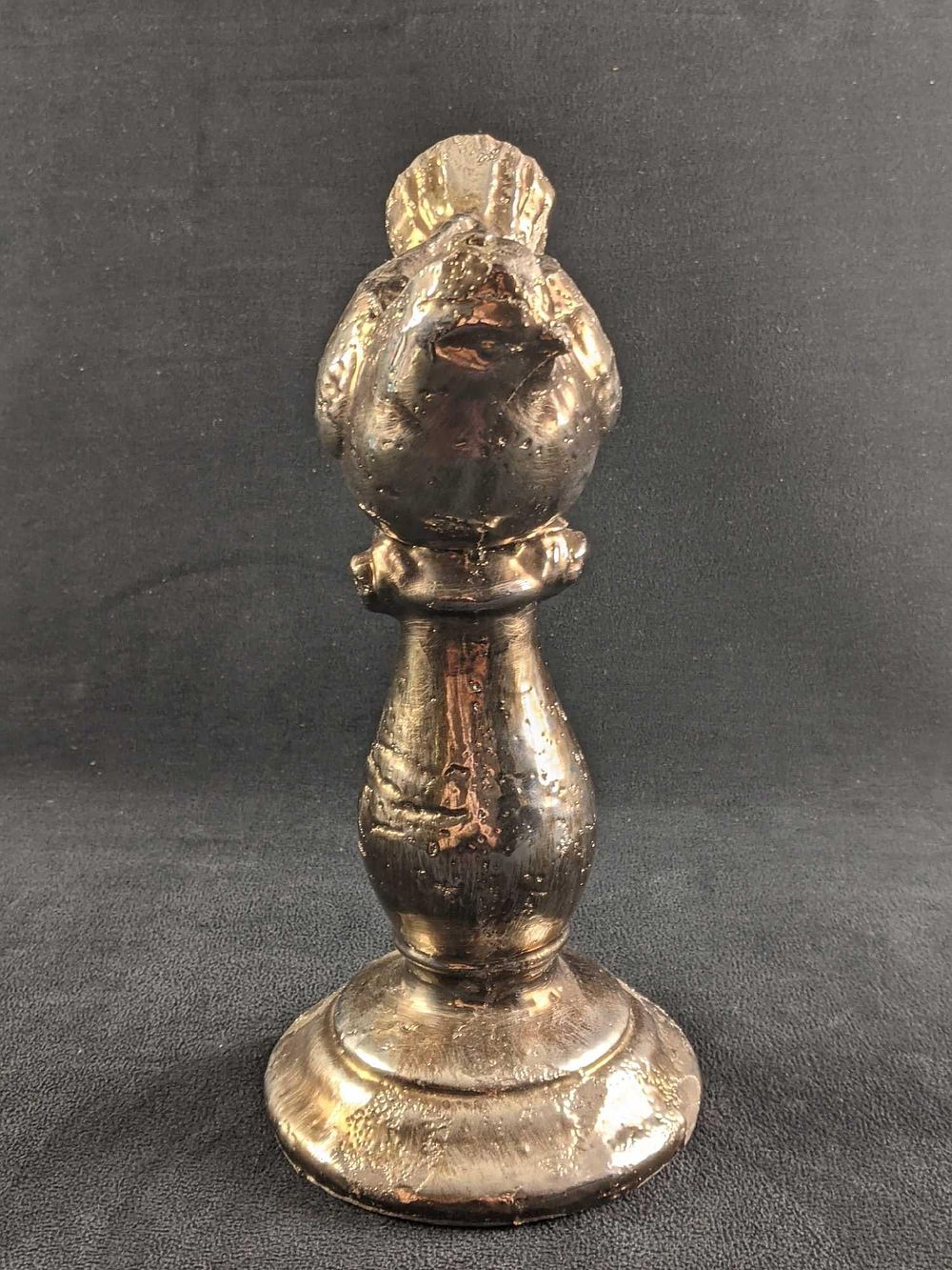 Ceramic Bird Sculpture With Metallic Glaze 
This cute bird is ceramic with a metallic glaze 