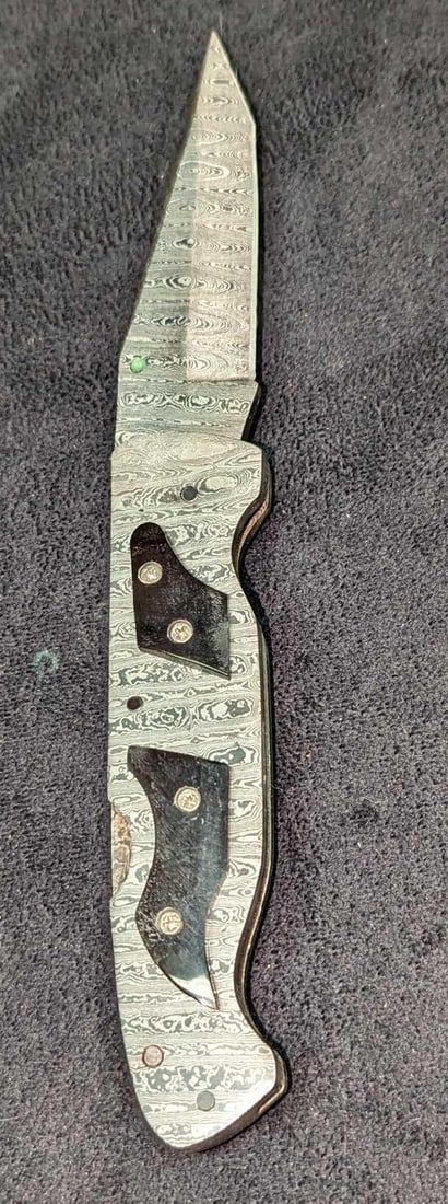 Lot 158: Damascus Steel Fold Up Black Bone Handle Knife Retired C