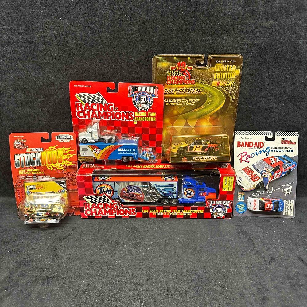 Lot 188: Racing Champions NASCAR Collectibles Set of Five 5 Vehicles Cars Transporter