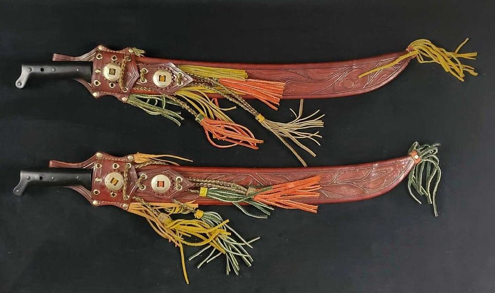 Lot 478: Vintage Corneta South America Machetes W Sheaths